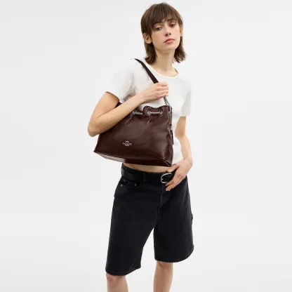 COACH®,Evelyn Shoulder Bag With Quilting,Leather,Bucket,Metal,Logo,Gold Metal,Day Party,Brown,Detail View