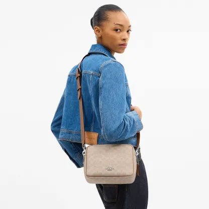 COACH®,Carey Crossbody Bag In Signature Canvas,Leather,Canvas,Recycled Polyester,Camera Bag,Metal,Logo,Sustainable,Gold Pl...,Multi Color
