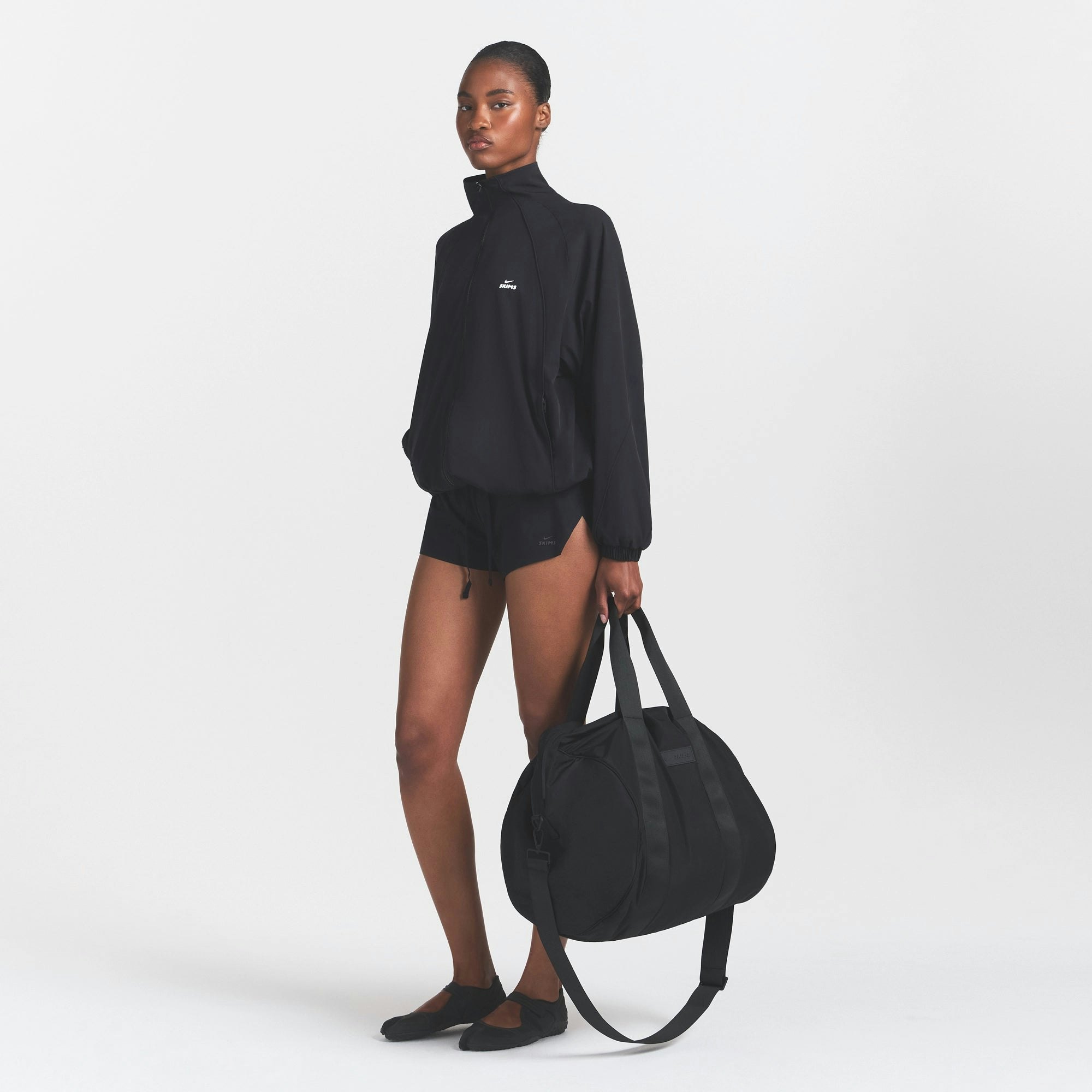 NikeSKIMS ACCESSORIES PUFFER GYM BAG - OBSIDIAN
