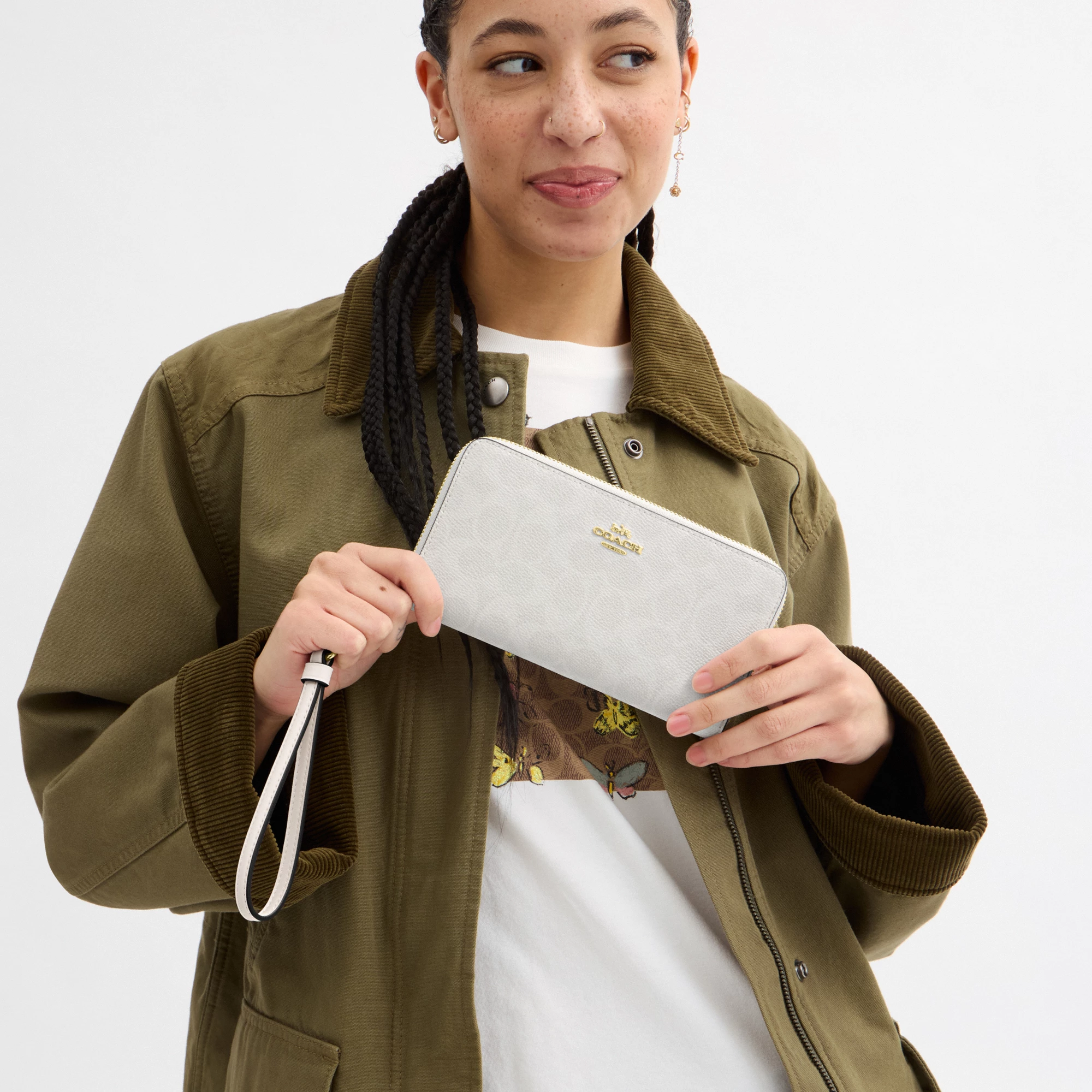 COACH®,Long Zip Around Wallet In Signature Canvas,Continental,Coin,Sustainable,Casual,White,Detail View