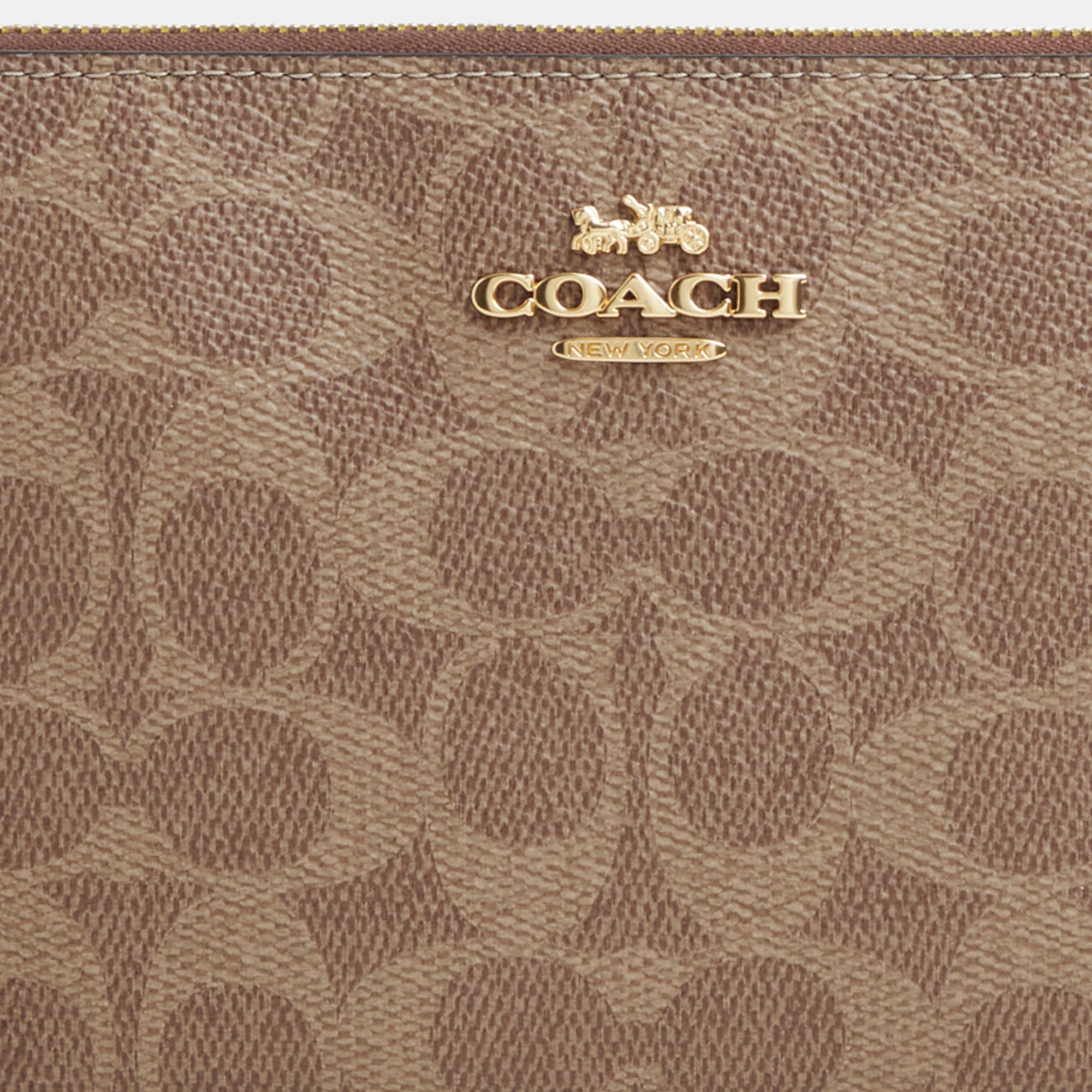 COACH®,Large Corner Zip Wristlet In Signature Canvas,Canvas,Wristlet,Casual,Brown