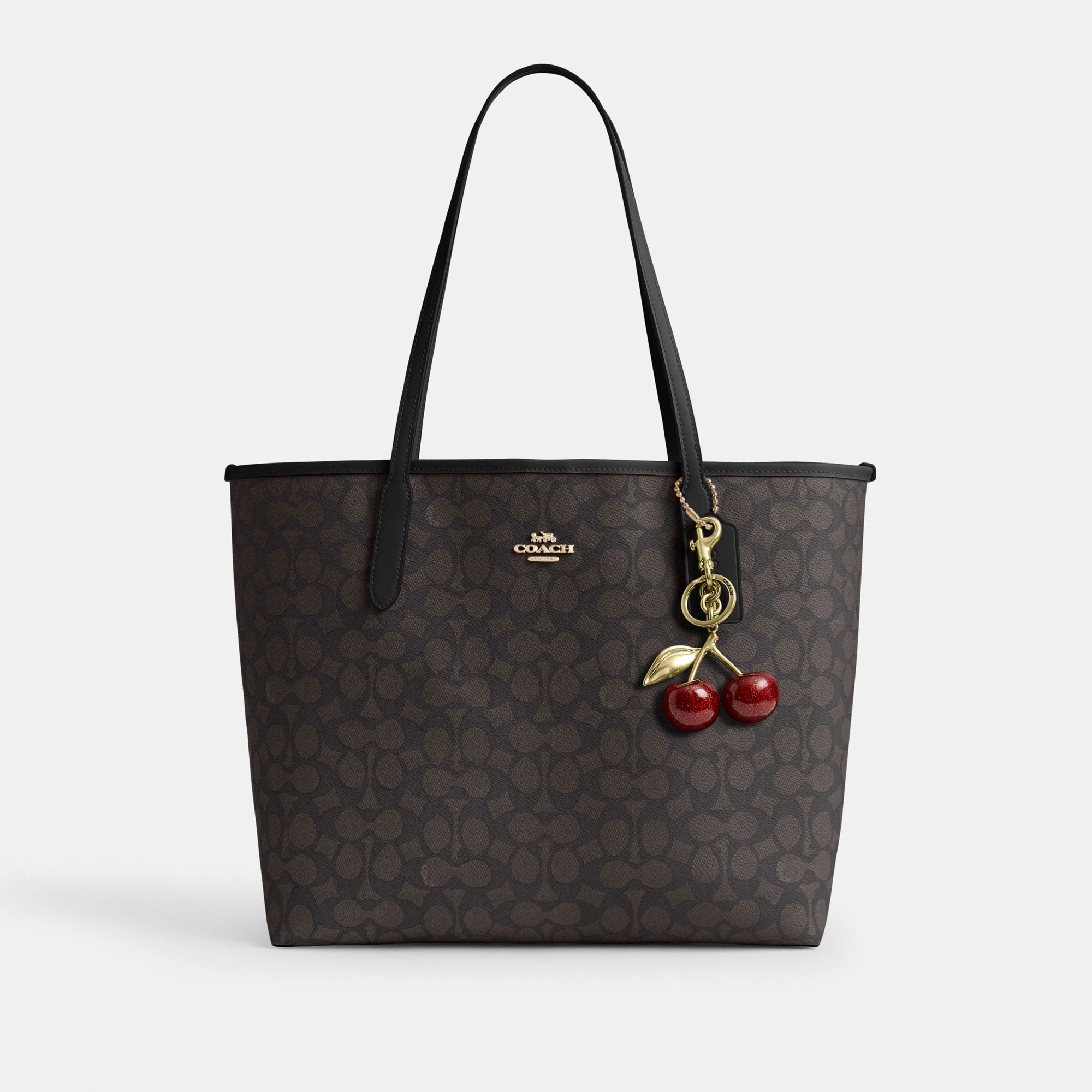 COACH®,City Tote Bag In Signature Canvas,Tote,Metal,Tag Embellishment,Color Block,Embossed,Piping,Logo,Casual,Multi Color,Angle View