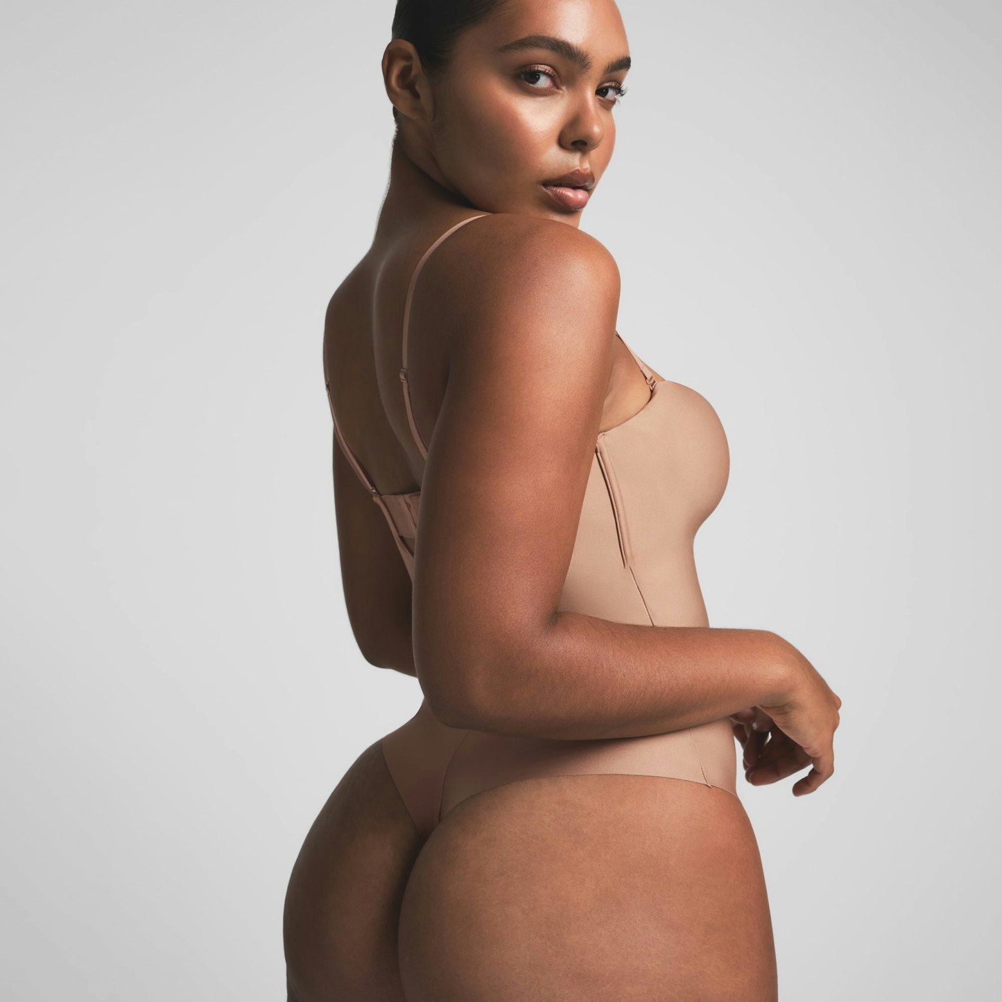 SKIMS BODY UNDERWIRE THONG BODYSUIT - SIENNA