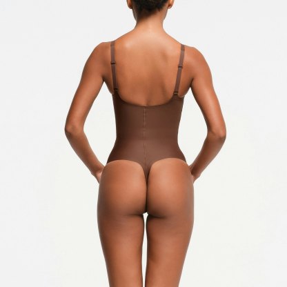 SKIMS BODY CORE SCULPT PLUNGE THONG BODYSUIT - JASPER
