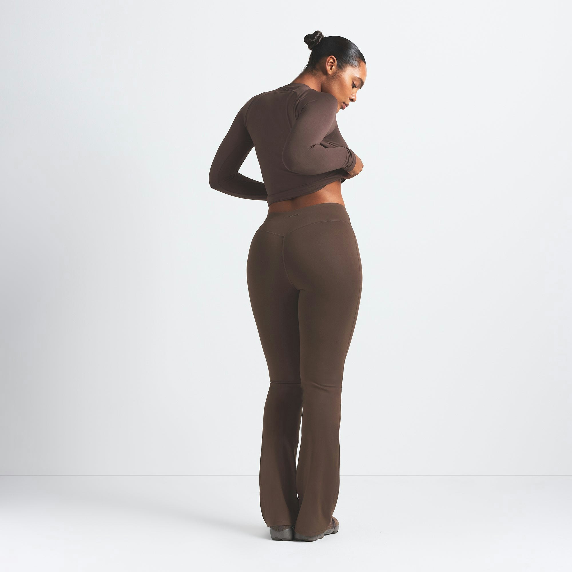 NikeSKIMS MATTE SLIM FLARE LEGGING - DARK SEPIA - image 14