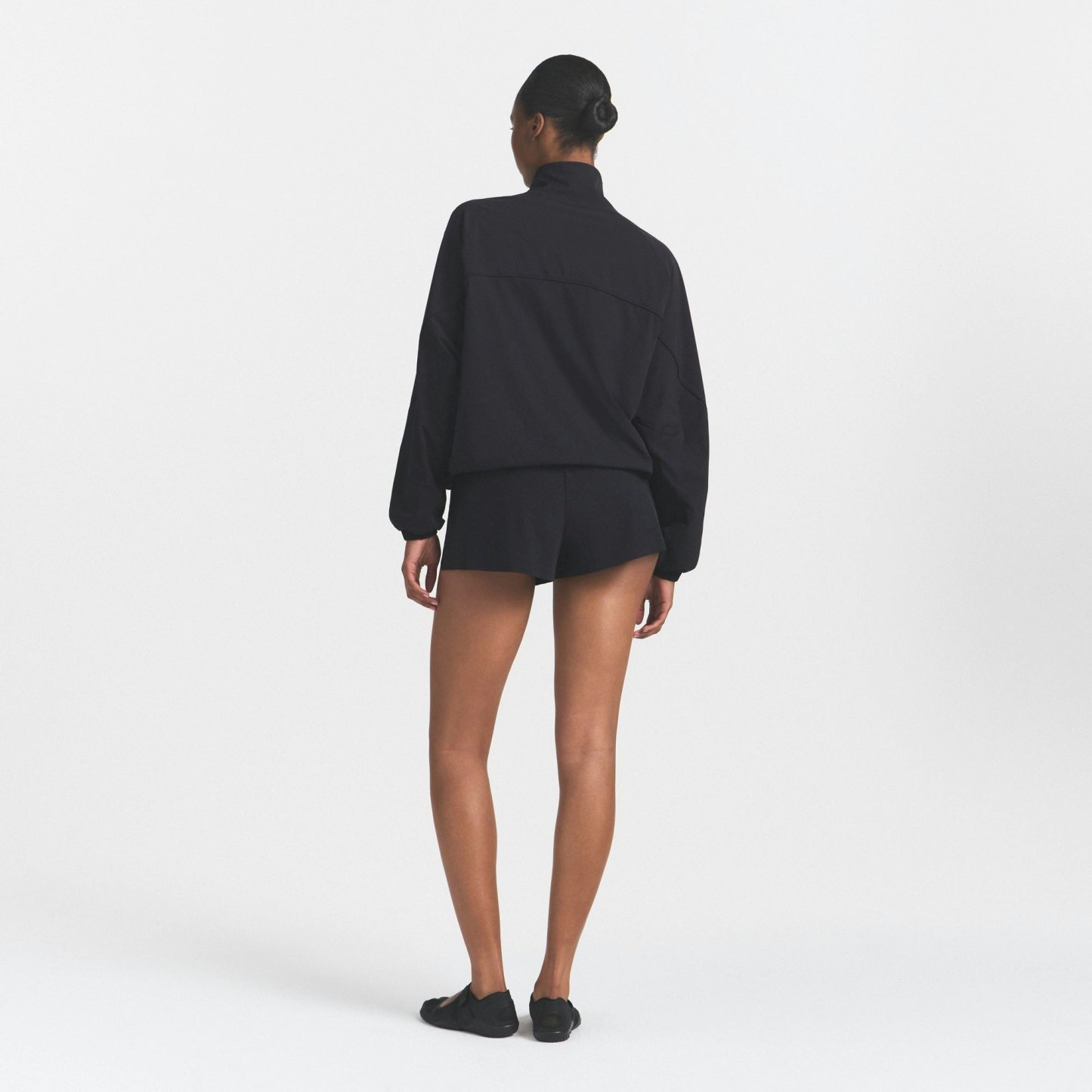 NikeSKIMS STRETCH NYLON OVERSIZED TRACK JACKET - OBSIDIAN - image 10