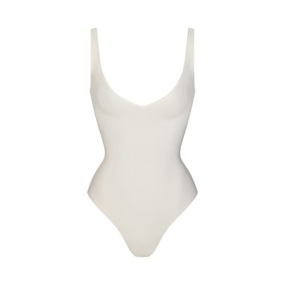 SKIMS BODY UNLINED PLUNGE THONG BODYSUIT - IVORY