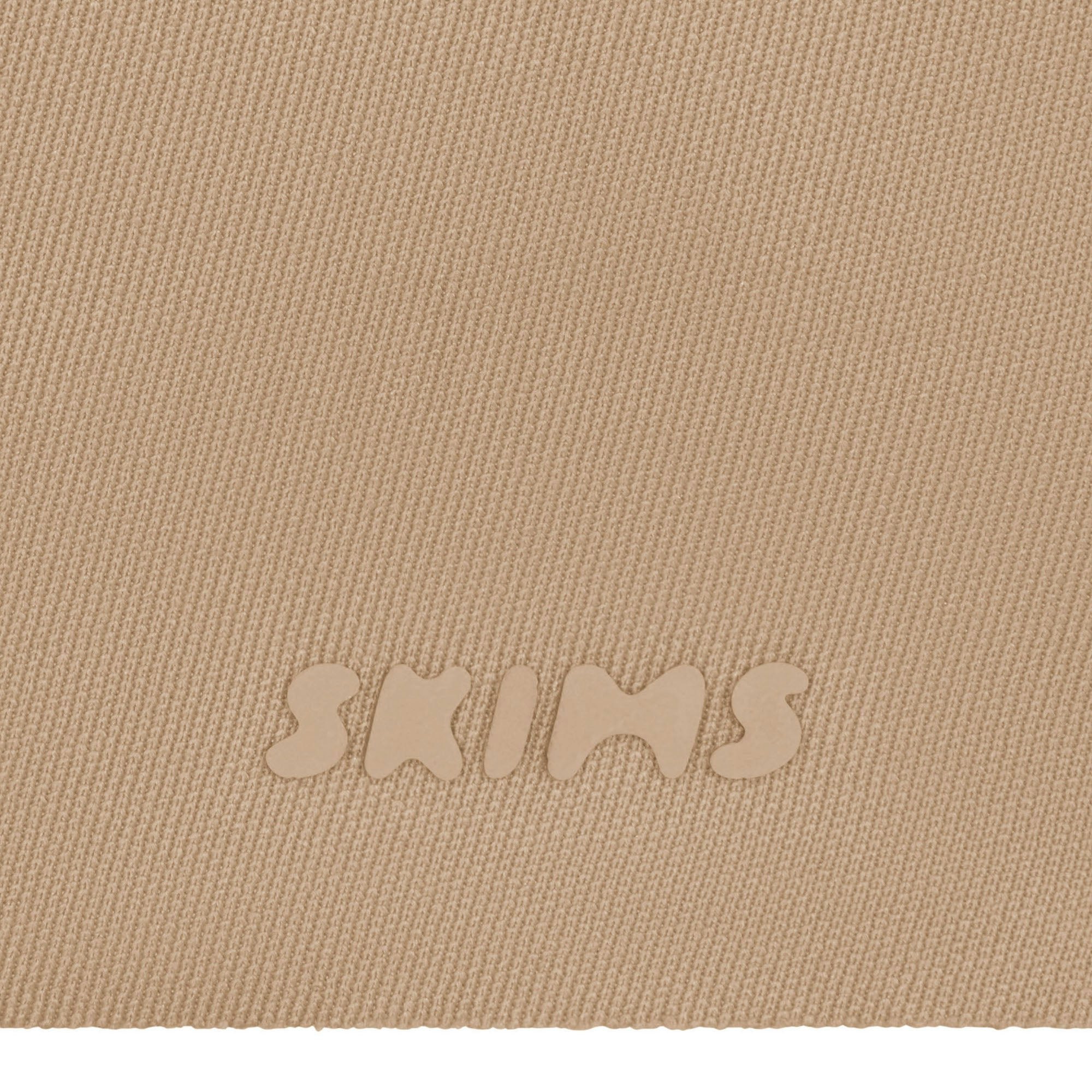 SKIMS ULTIMATE BODY PUSH-UP THONG BODYSUIT - CLAY