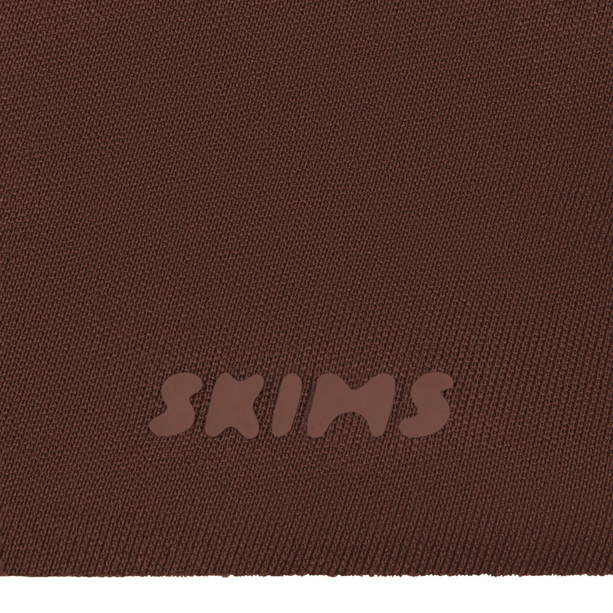 SKIMS ULTIMATE BODY PUSH-UP THONG BODYSUIT - COCOA