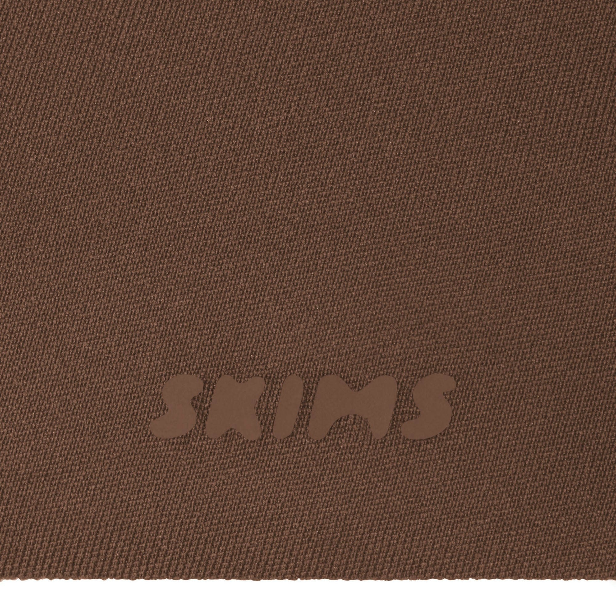 SKIMS ULTIMATE BODY PUSH-UP THONG BODYSUIT - JASPER