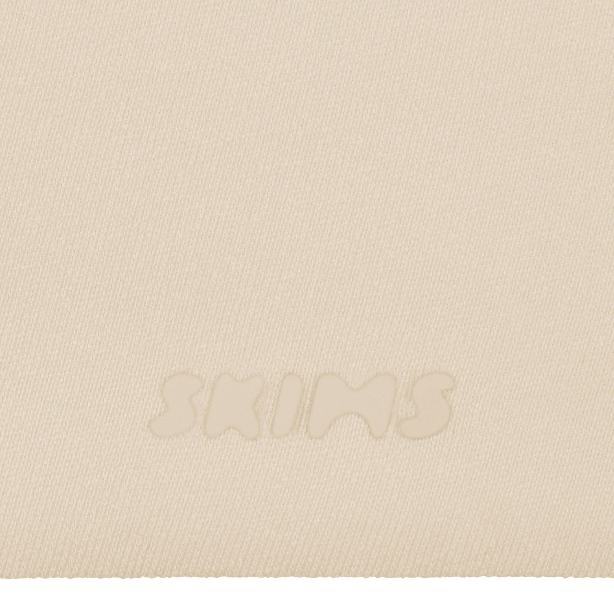 SKIMS ULTIMATE BODY PUSH-UP THONG BODYSUIT - SAND