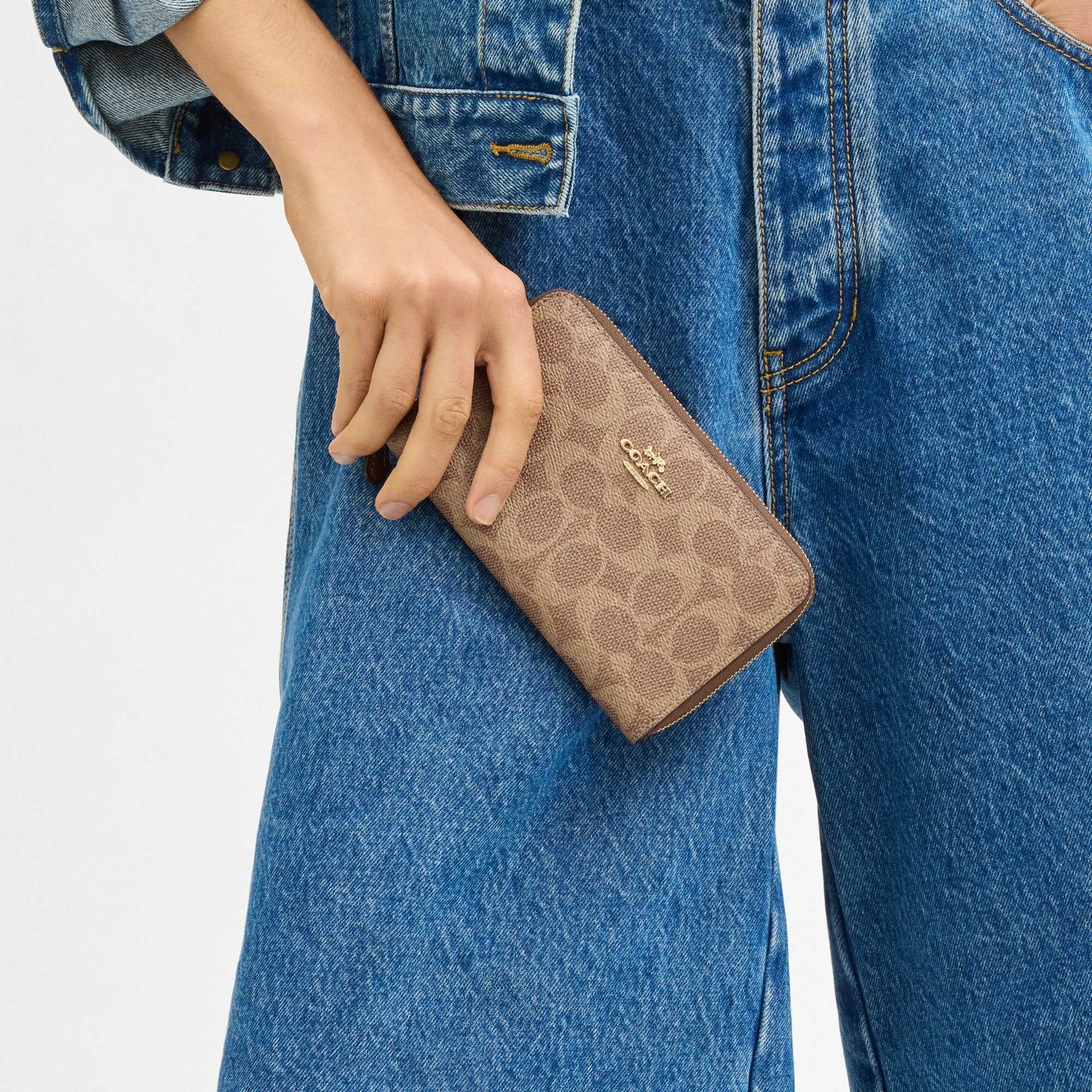 COACH®,Medium Id Zip Wallet In Signature Canvas,Bi Fold,Continental,Coin,Sustainable,Casual,Brown,Detail View