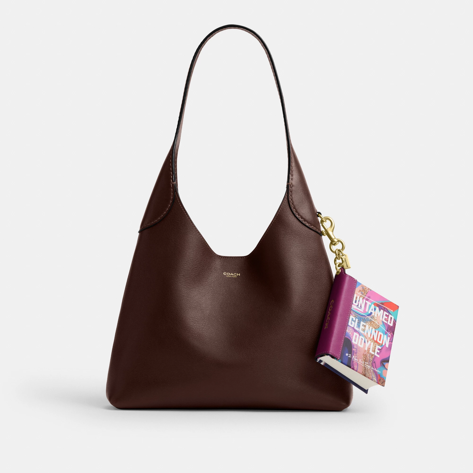 COACH®,Untamed By Glennon Doyle Book Bag Charm,Leather,Bag Charm,Paper,3D Embellishment,Color Block,Logo,Adjustable,Key Ring,Multi Color,Angle View