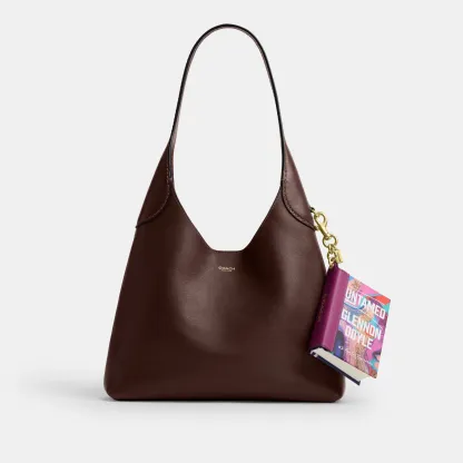 COACH®,Untamed By Glennon Doyle Book Bag Charm,Leather,Bag Charm,Paper,3D Embellishment,Color Block,Logo,Adjustable,Key Ring,Multi Color,Angle View