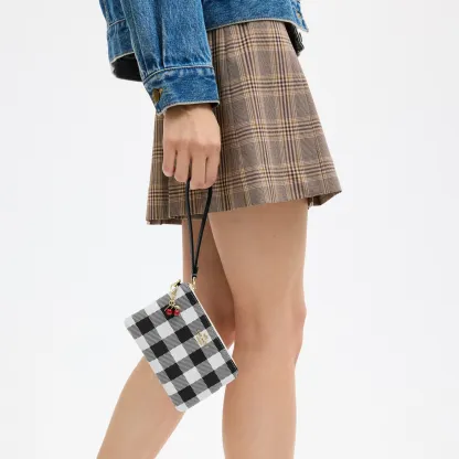 COACH®,Corner Zip Wristlet With Gingham Print And Charm,,Detail View