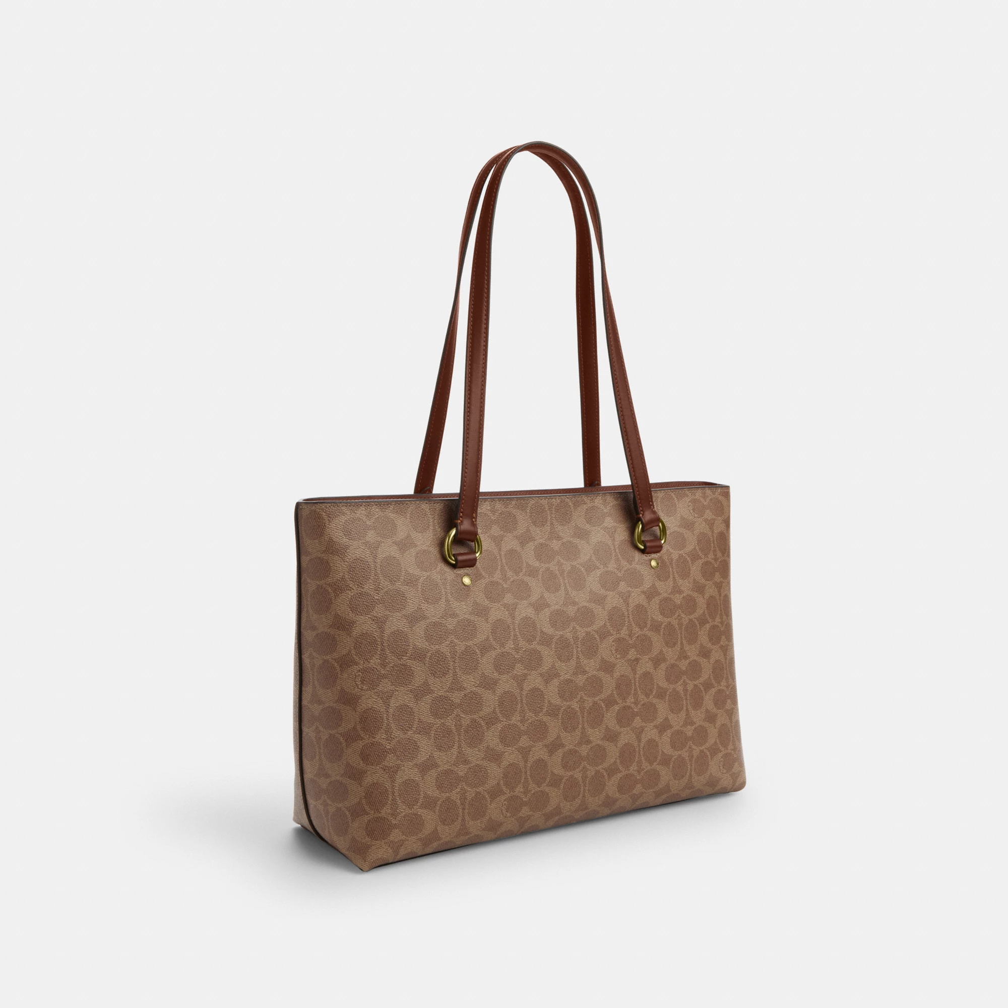 COACH®,Station Tote Bag In Signature Canvas,Canvas,Fabric,Mixed Media,Leather,Tote,Logo,Pattern,Luggage Tag,Lined,Silver M...,Brown,Angle View