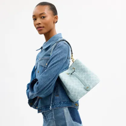 Rowan Bucket Bag In Signature Canvas - signature canvas/Gold/Light Blue - view 9