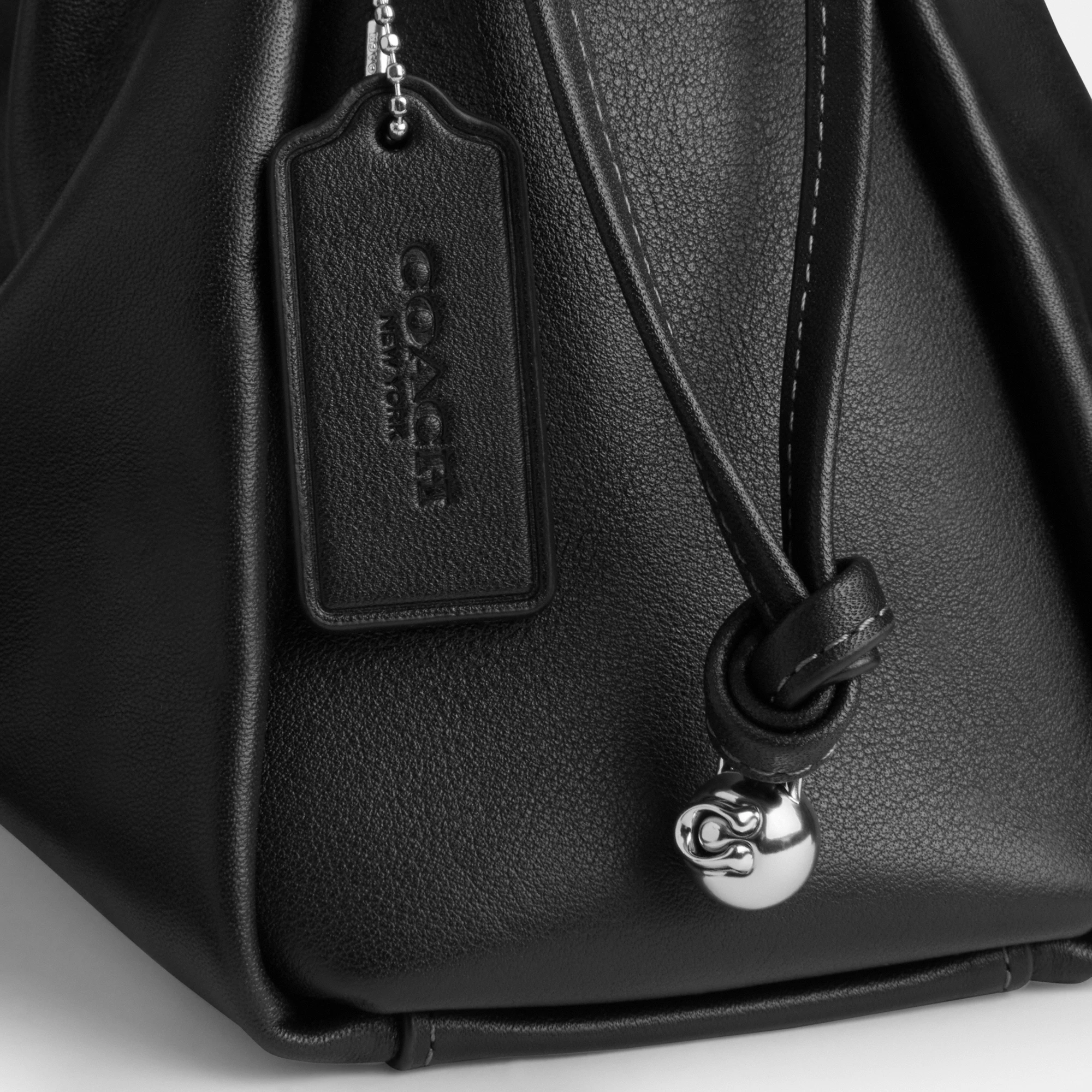 COACH®,Faye Large Shoulder Bag,Leather,Bucket,Logo,Ruched,Metal,Shoulder Guard,Lined,Silver Metal,Day Party,Black,Closer View