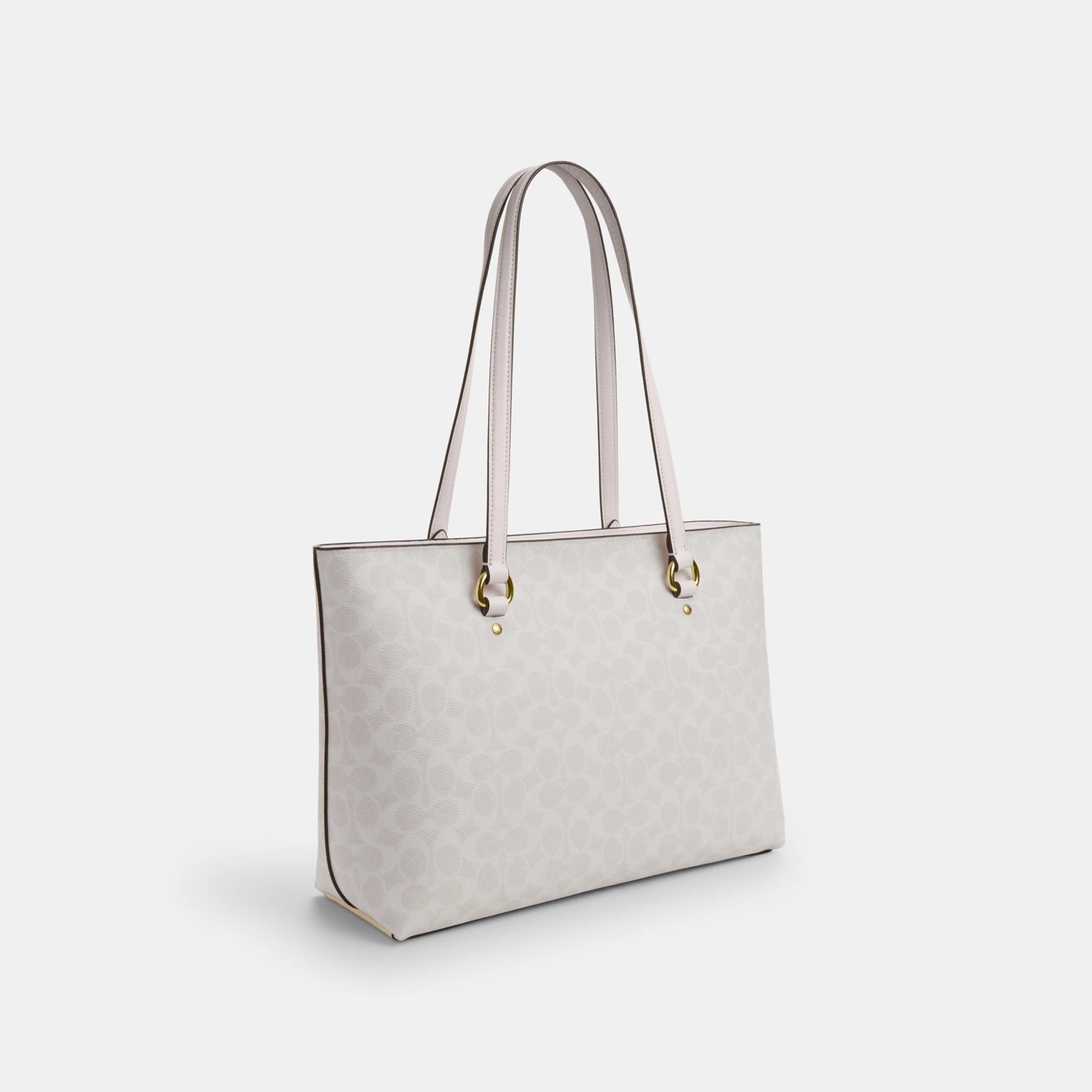 COACH®,Station Tote Bag In Signature Canvas,Canvas,Fabric,Mixed Media,Leather,Tote,Logo,Pattern,Luggage Tag,Lined,Silver M...,Multi Color,Angle View