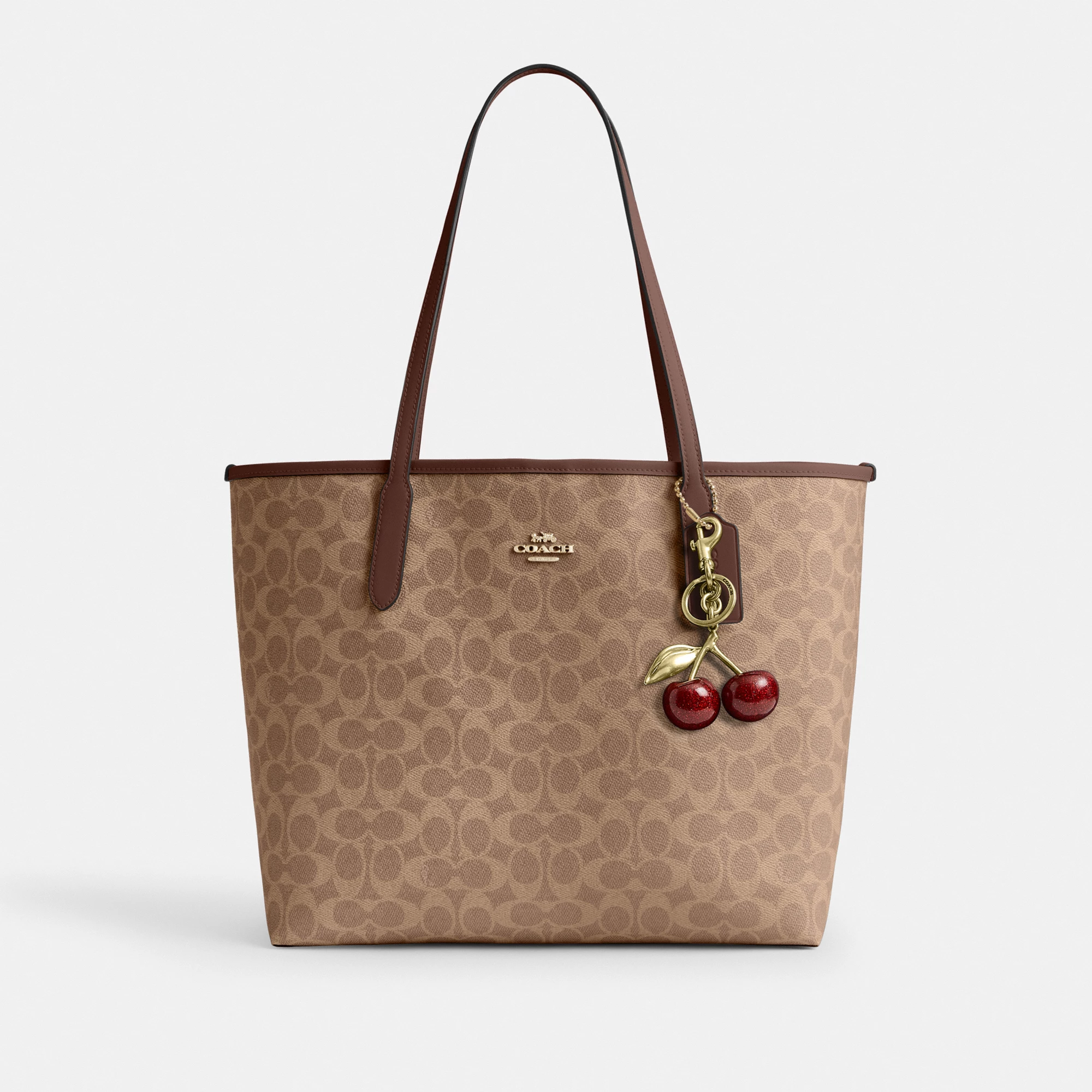 COACH®,City Tote Bag In Signature Canvas,Tote,Metal,Tag Embellishment,Color Block,Embossed,Piping,Logo,Casual,Multi Color,Angle View