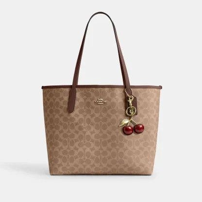 COACH®,City Tote Bag In Signature Canvas,Tote,Metal,Tag Embellishment,Color Block,Embossed,Piping,Logo,Casual,Multi Color,Angle View
