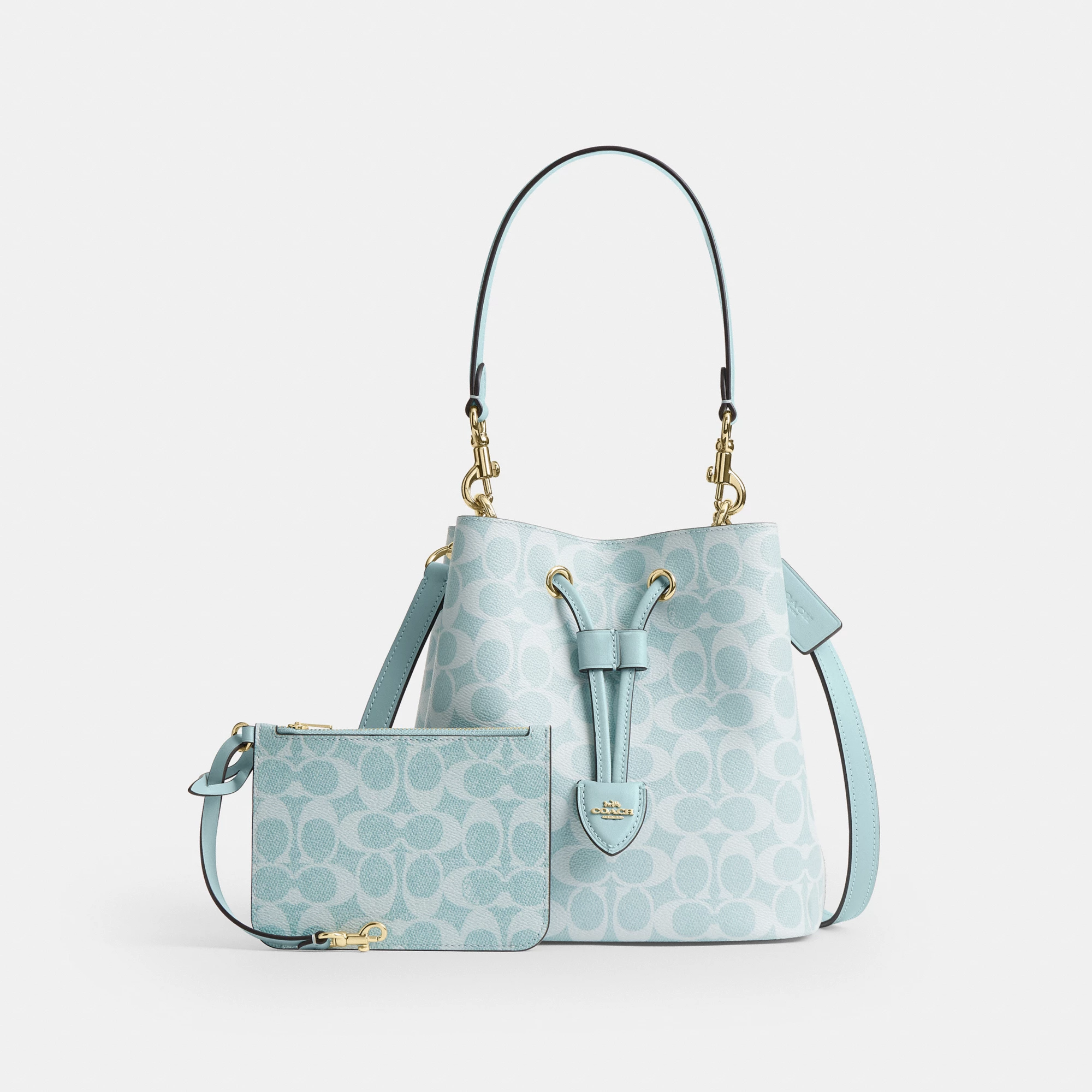 COACH®,Rowan Bucket Bag In Signature Canvas,Polyester,Leather,Recycled Polyester,Canvas,Bucket,Logo,Drawstring,Metal,Adjus...,Blue,Angle View