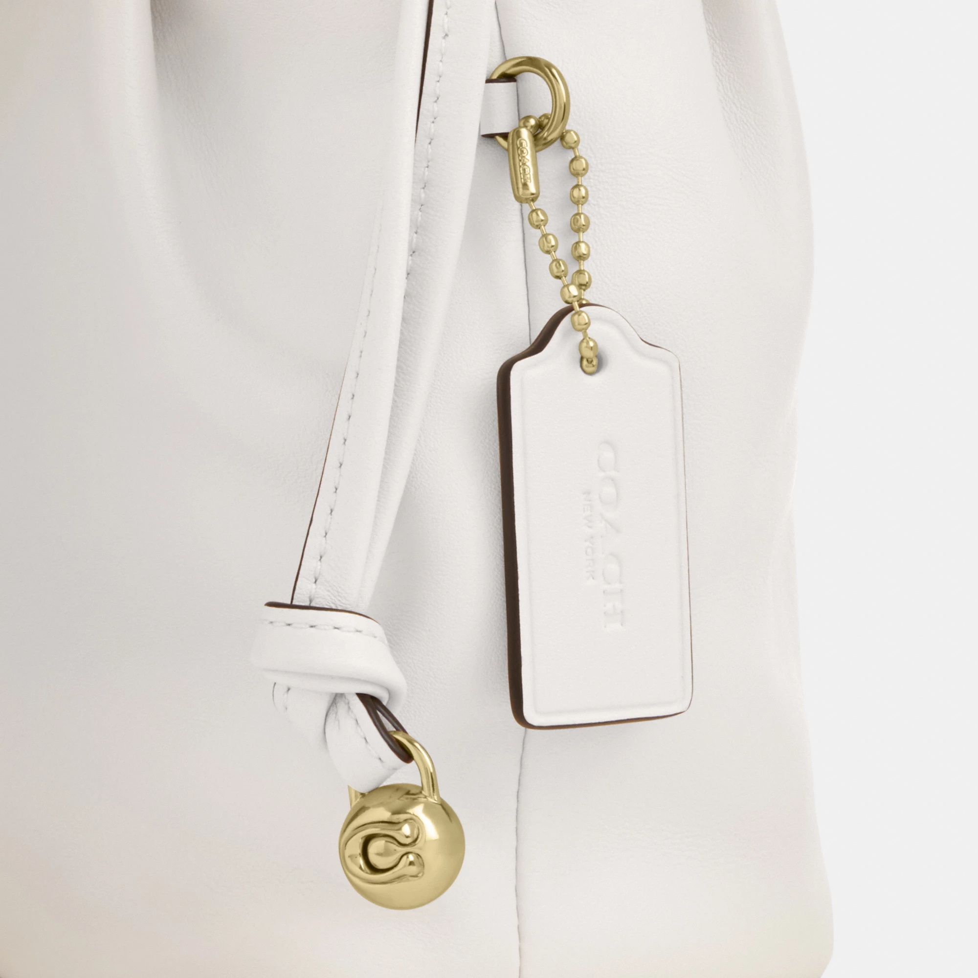 COACH®,Faye Mini Drawstring Bag,Leather,Bucket,Logo,Metal,Silver Metal,Day Party,White,Closer View