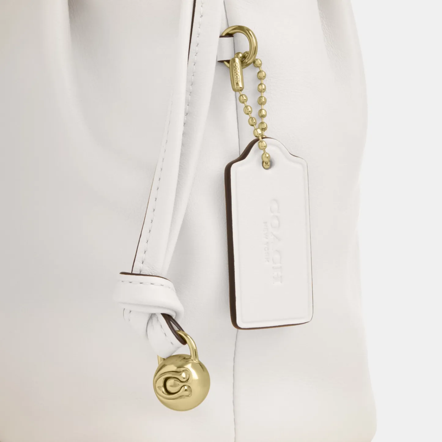 COACH®,Faye Mini Drawstring Bag,Leather,Bucket,Logo,Metal,Silver Metal,Day Party,White,Closer View