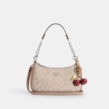 COACH®,Teri Shoulder Bag In Signature Canvas,Shoulder Bag,Logo,Tag Embellishment,Embossed,Metal,Casual,Beige,Angle View