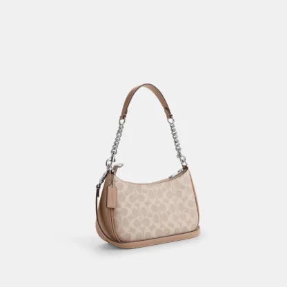 COACH®,Teri Shoulder Bag In Signature Canvas,Shoulder Bag,Logo,Tag Embellishment,Embossed,Metal,Casual,Beige,Angle View