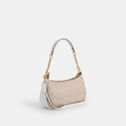 COACH®,Teri Shoulder Bag In Signature Canvas,Shoulder Bag,Logo,Tag Embellishment,Embossed,Metal,Casual,Beige,Angle View
