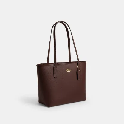 COACH®,Medium City Tote Bag,Brown,Angle View