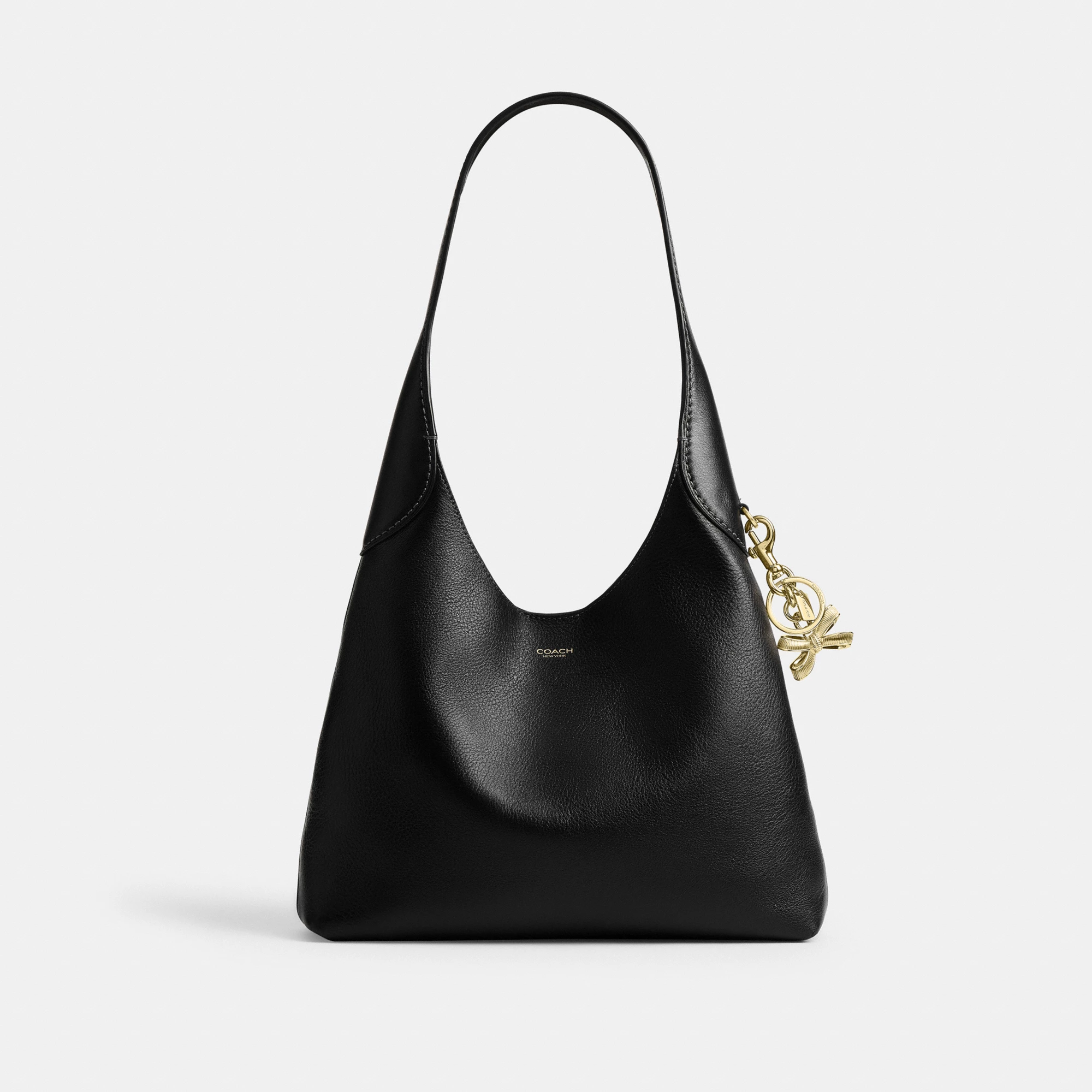 COACH®,Bow Bag Charm,Key Chain,Metal Material,Bow,Silver Plated,Gold,Angle View