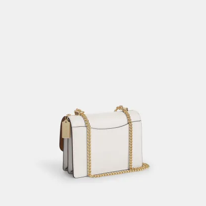 COACH®,Klare Crossbody Bag In Signature Canvas,Crossbody,Chain Detail,Pattern,Day Party,White,Angle View