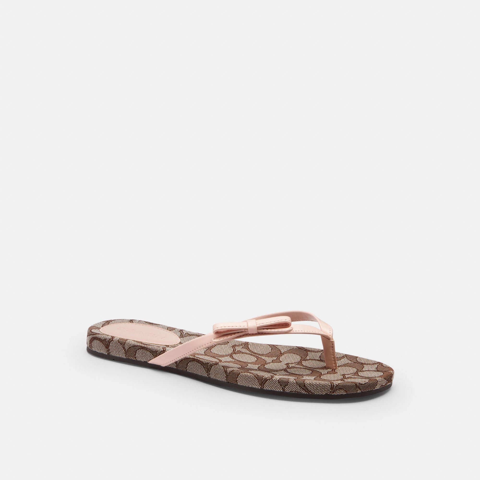 COACH®,Bow Flip Flop In Signature Jacquard,Brown,Front View