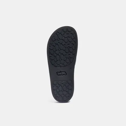 COACH®,Udele Sport Slide In Signature Canvas,Canvas,Rubber,EVA,Slides,Logo,Pull Tab,Cushioned Outsole,Casual,Black,Outsole View