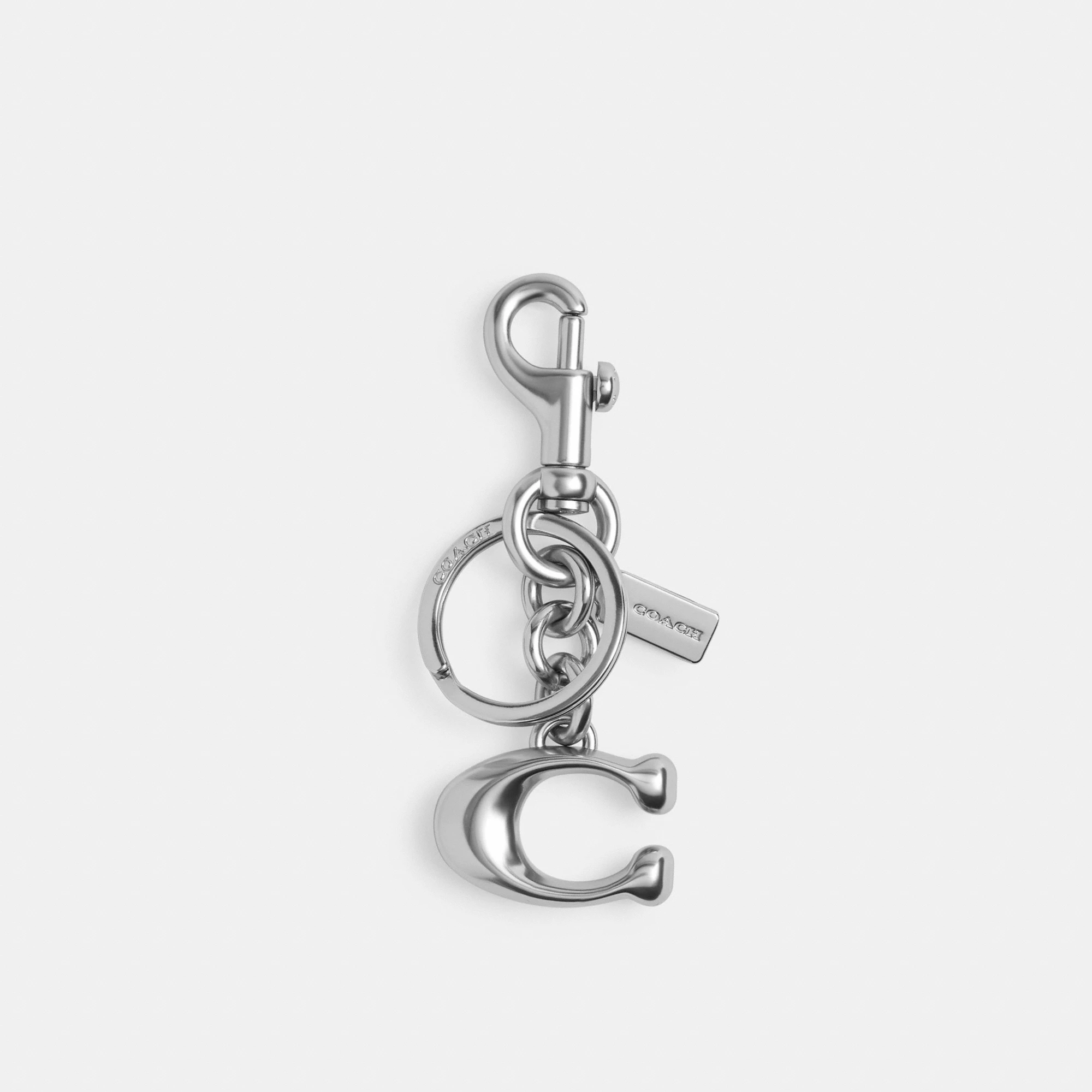 COACH®,Signature Bag Charm,Bag Charm,Metal Material,Logo,Embossed,Key Ring,Mixed Metal,Day Party,Silver,Front View