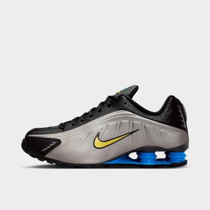 Men's Nithtke Shox R4 SE Brazil Casual Shoes - Black/Metallic Pewter/Light Photo Blue/Canary - Left shoe facing left. Outside of the shoe.