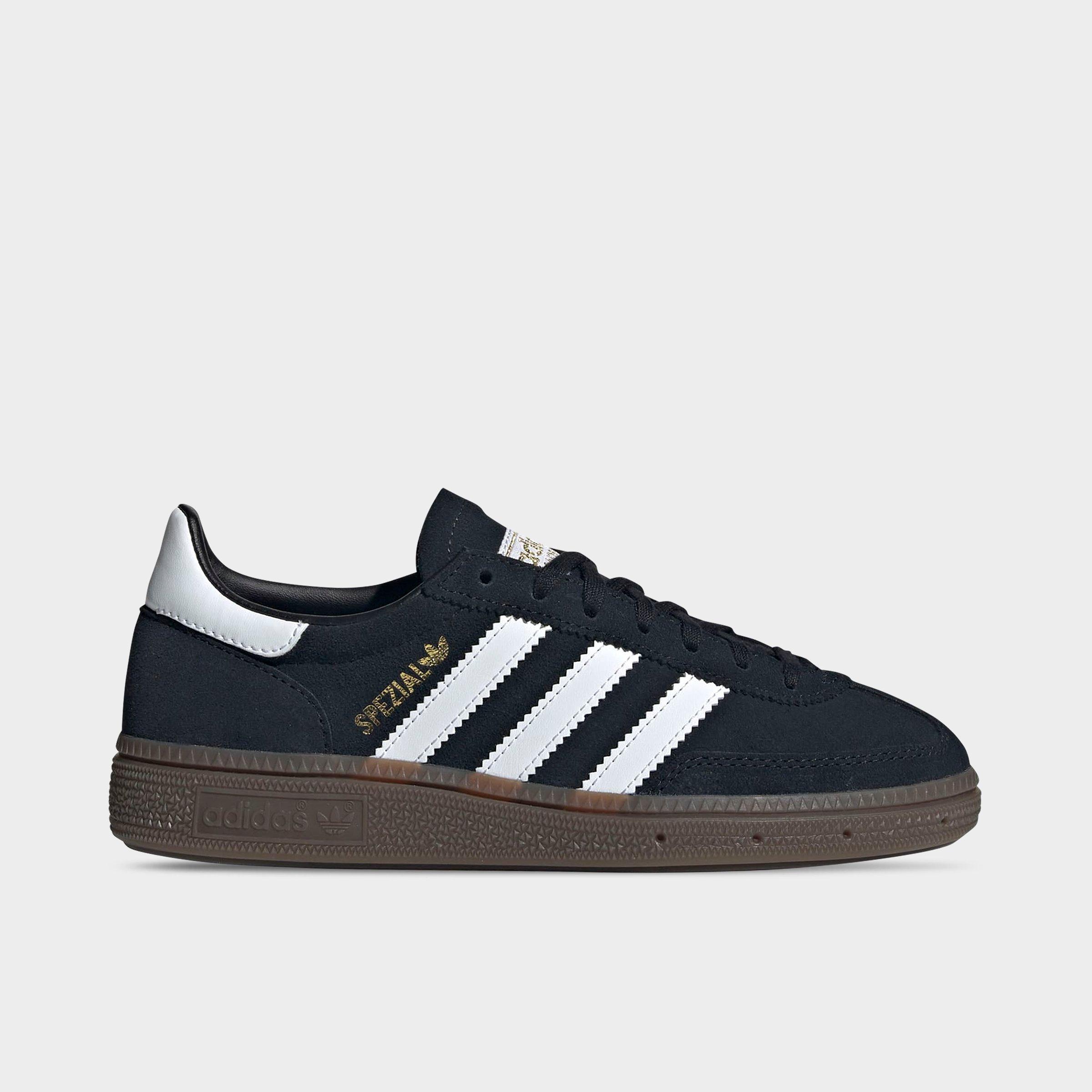 Big Kids' adidas Originals Handball Spezial Casual Shoes - Part 1 - Black/White/Gum - Left shoe facing left. Outside of the shoe.