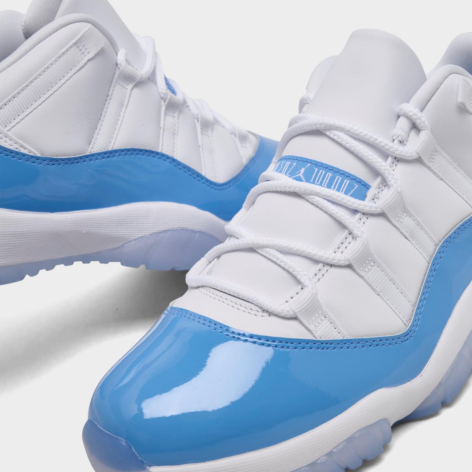 Men's Air Jordan Retro 11 Low Basketball Shoes - White/University Blue/Black - Left shoe facing left. Outside of the shoe. - view 3