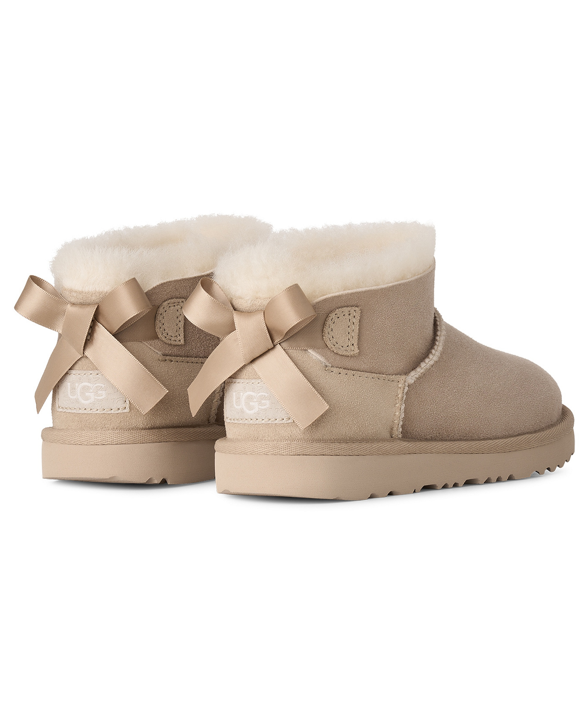 UGG® Kids Ultra Mini Bailey Bow Round Toe Booties - Sand