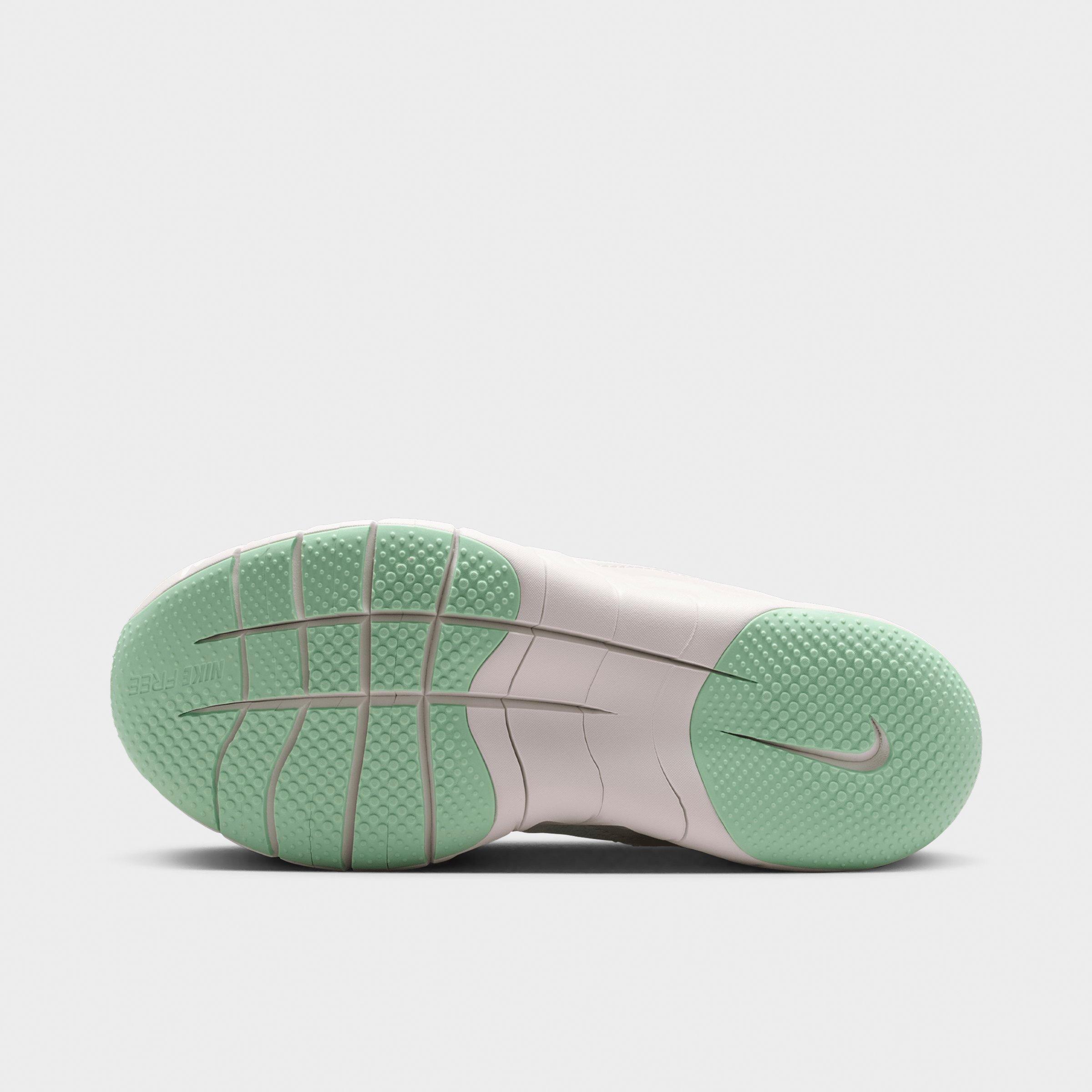 Big Kids' Nithtke Free Ride Running Shoes - Barely Green/Arctic Green/Phantom/Bright Spruce - Bottom view