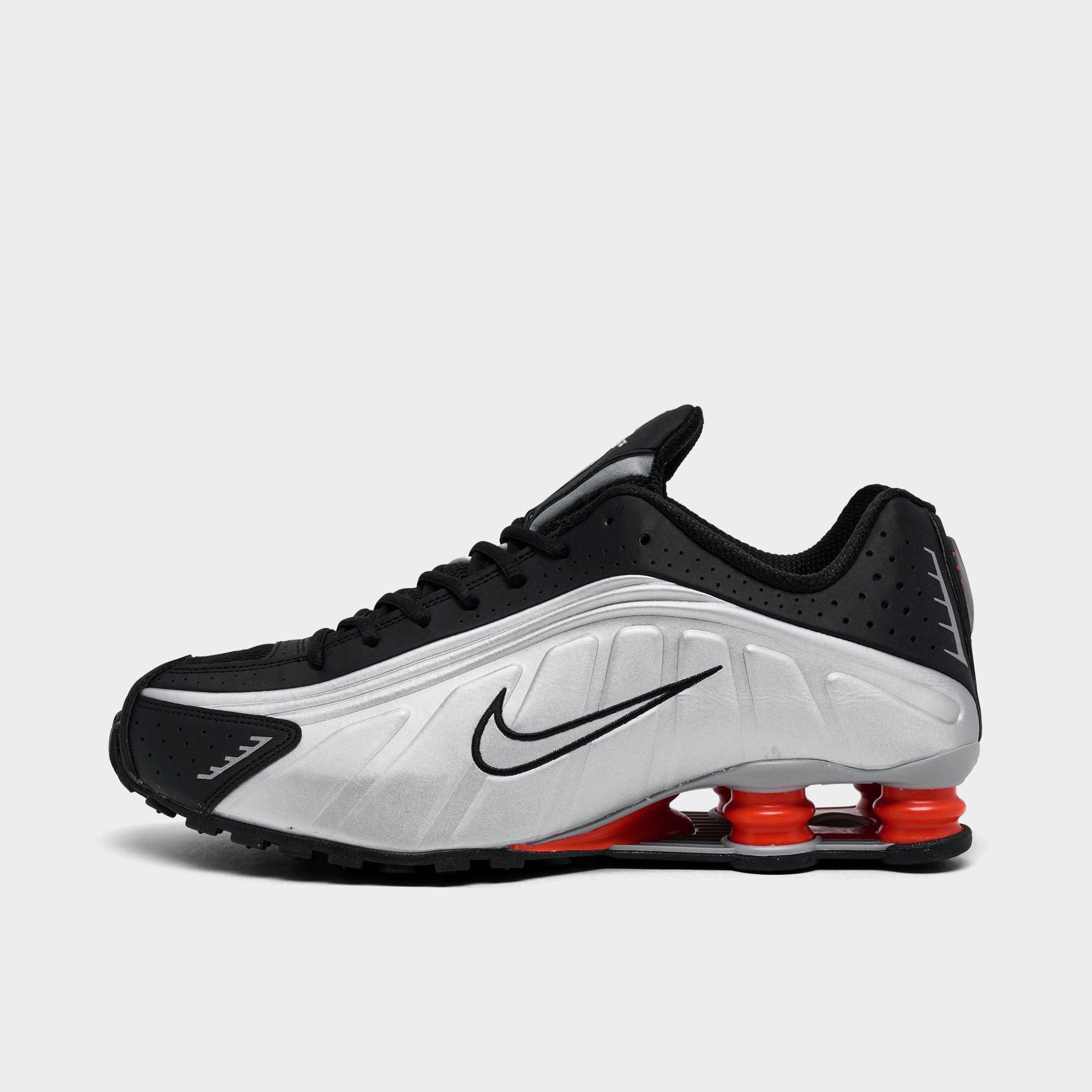 Men's Nithtke Shox R4 Casual Shoes - Metallic Silver/Black/Picante Red/Metallic Silver - Left shoe facing left. Outside of the shoe.