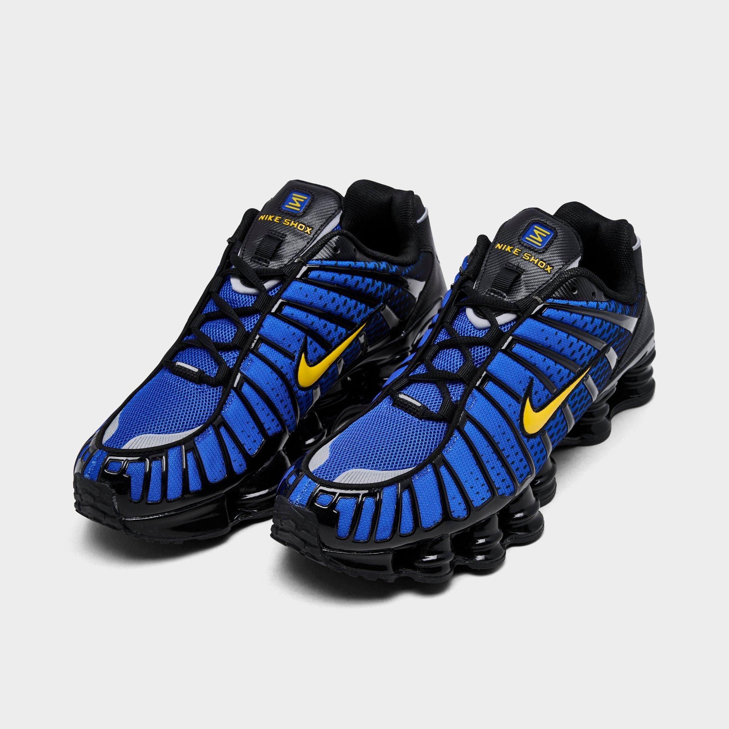 Men's Nithtke Shox TL Casual Shoes - Part 2 - Black/Metallic Silver/Lyon Blue/Varsity Maize - Both shoes facing left