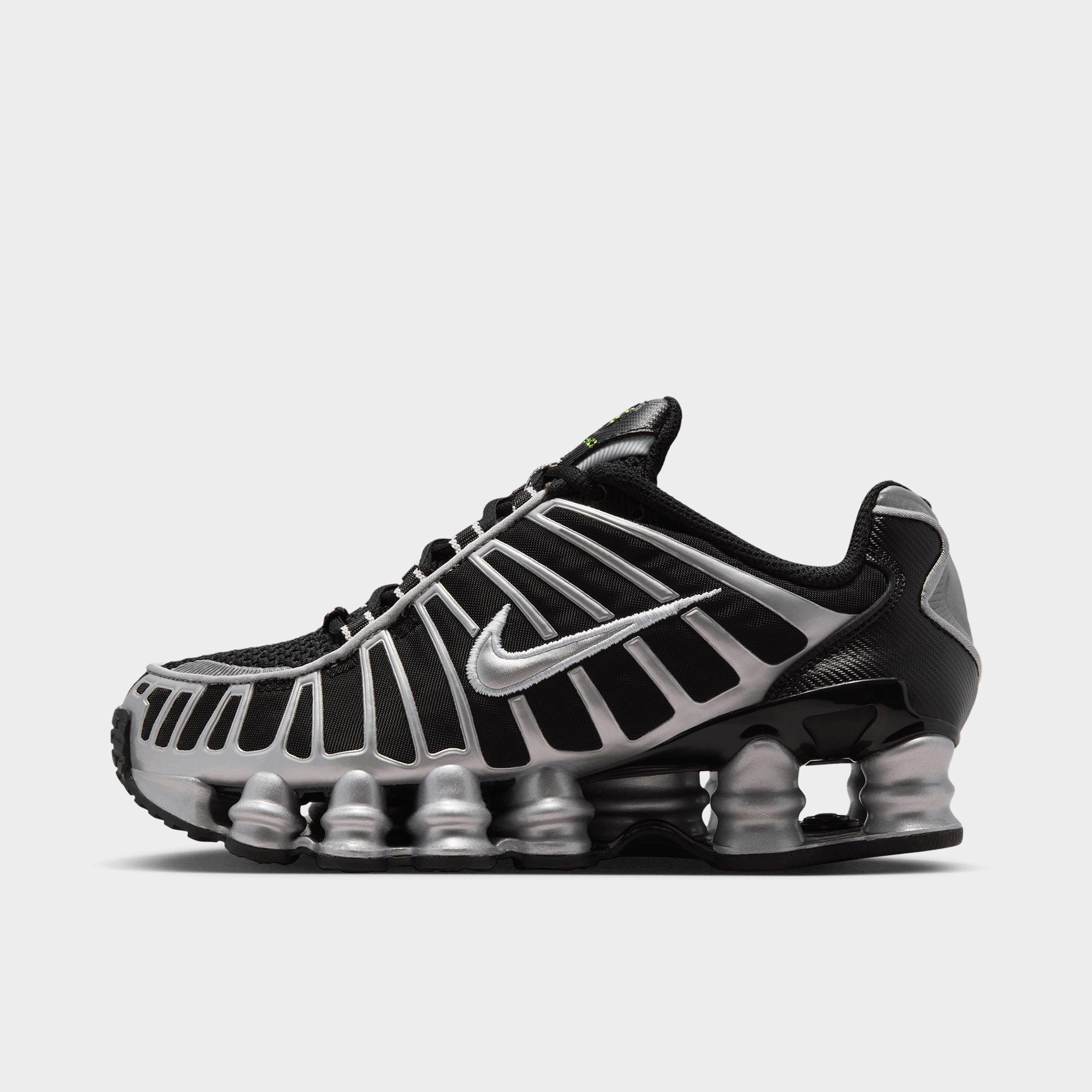 Big Kids' Nithtke Shox TL Casual Shoes - Black/Volt Ice/Photon Dust/Metallic Silver - Left shoe facing left. Outside of the shoe.