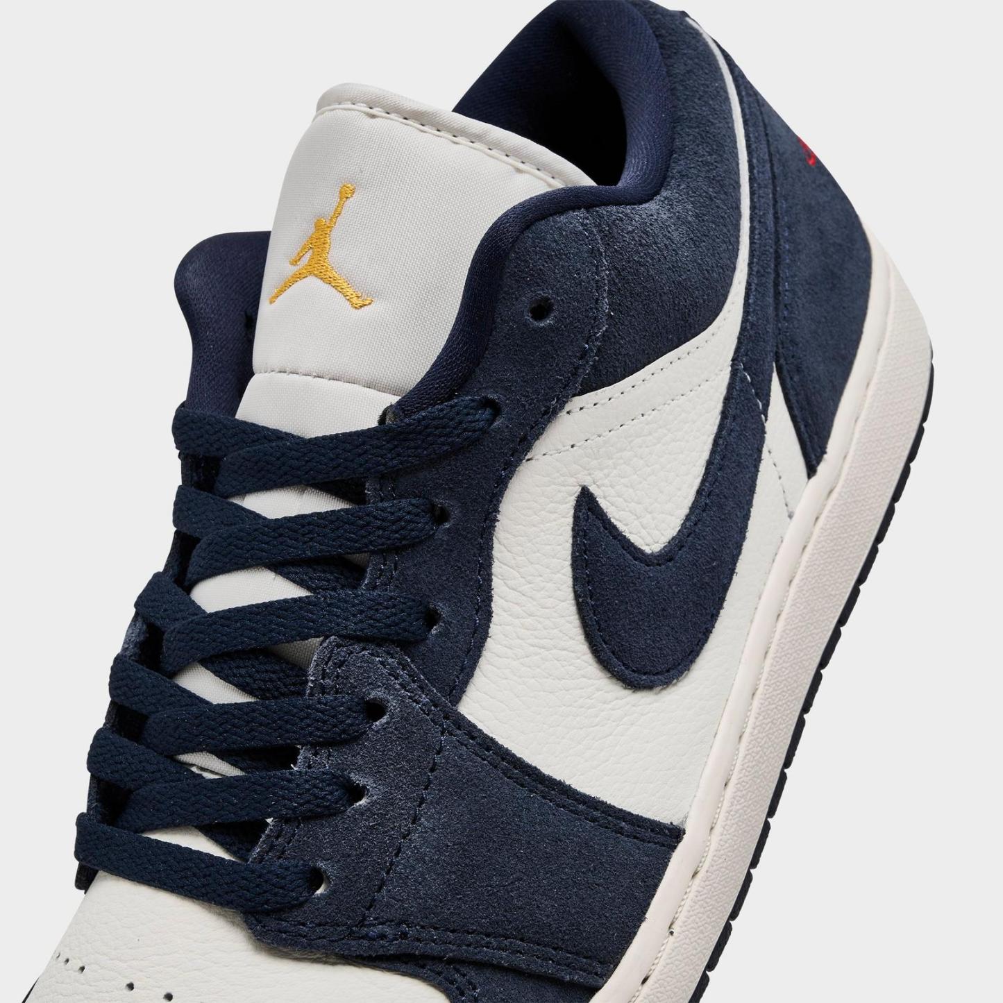 Men's Air Jordan Retro 1 Low SE Casual Shoes - Obsidian/University Gold/Chile Red/Obsidian - Left shoe facing left. Outside of the shoe. - view 3