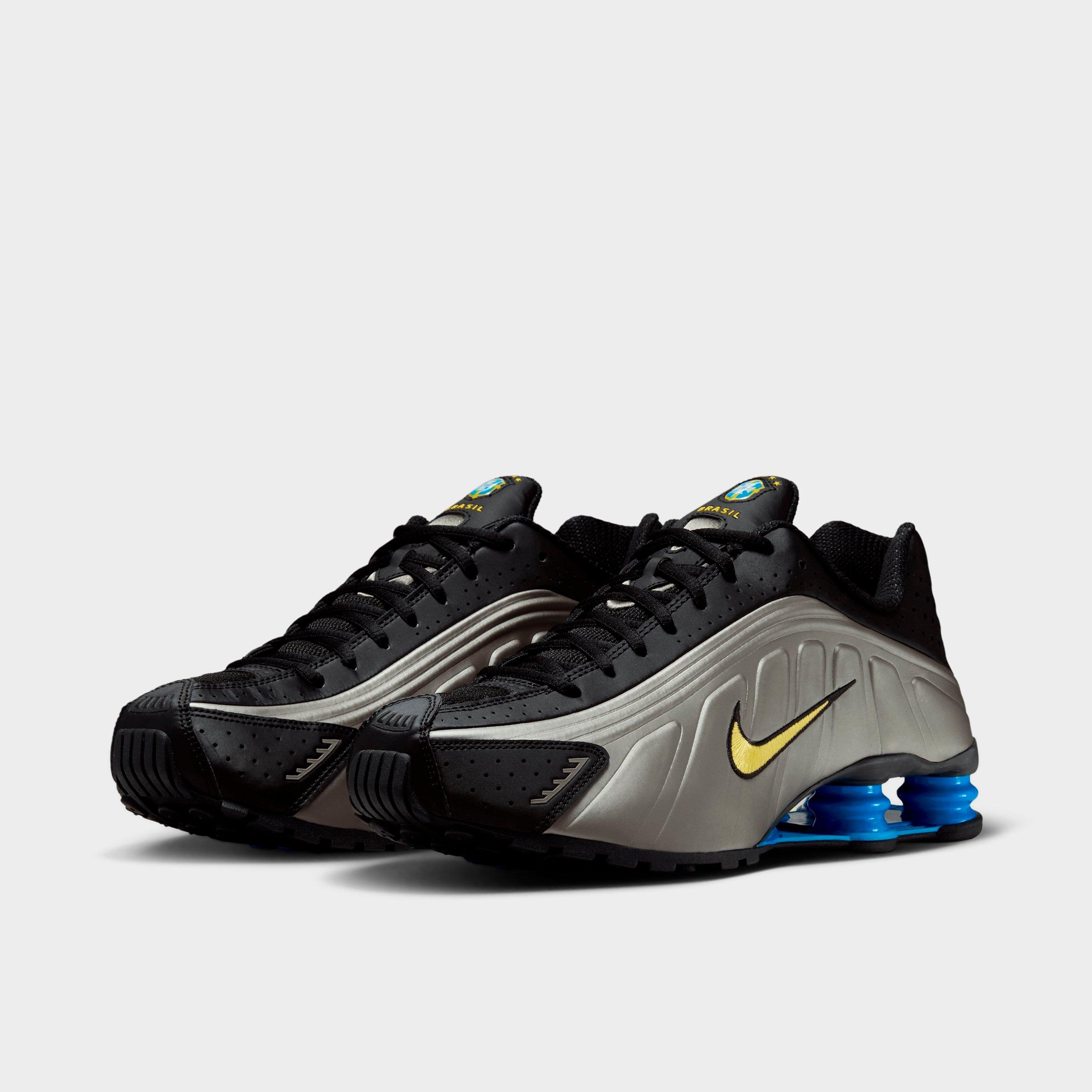 Men's Nithtke Shox R4 SE Brazil Casual Shoes - Black/Metallic Pewter/Light Photo Blue/Canary - Both shoes facing left