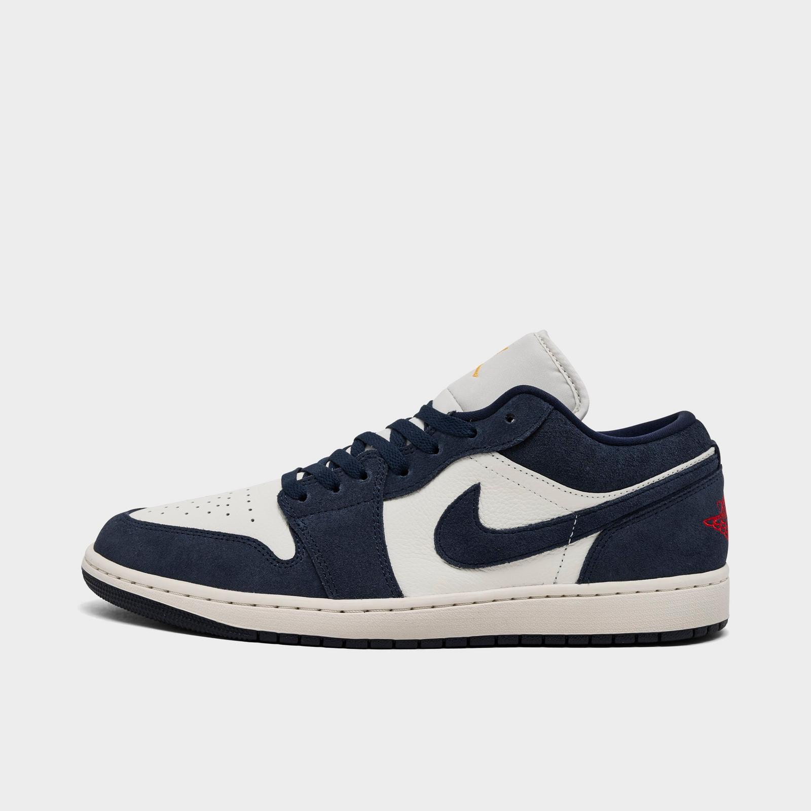 Men's Air Jordan Retro 1 Low SE Casual Shoes - Obsidian/University Gold/Chile Red/Obsidian - Left shoe facing left. Outside of the shoe. - view 1