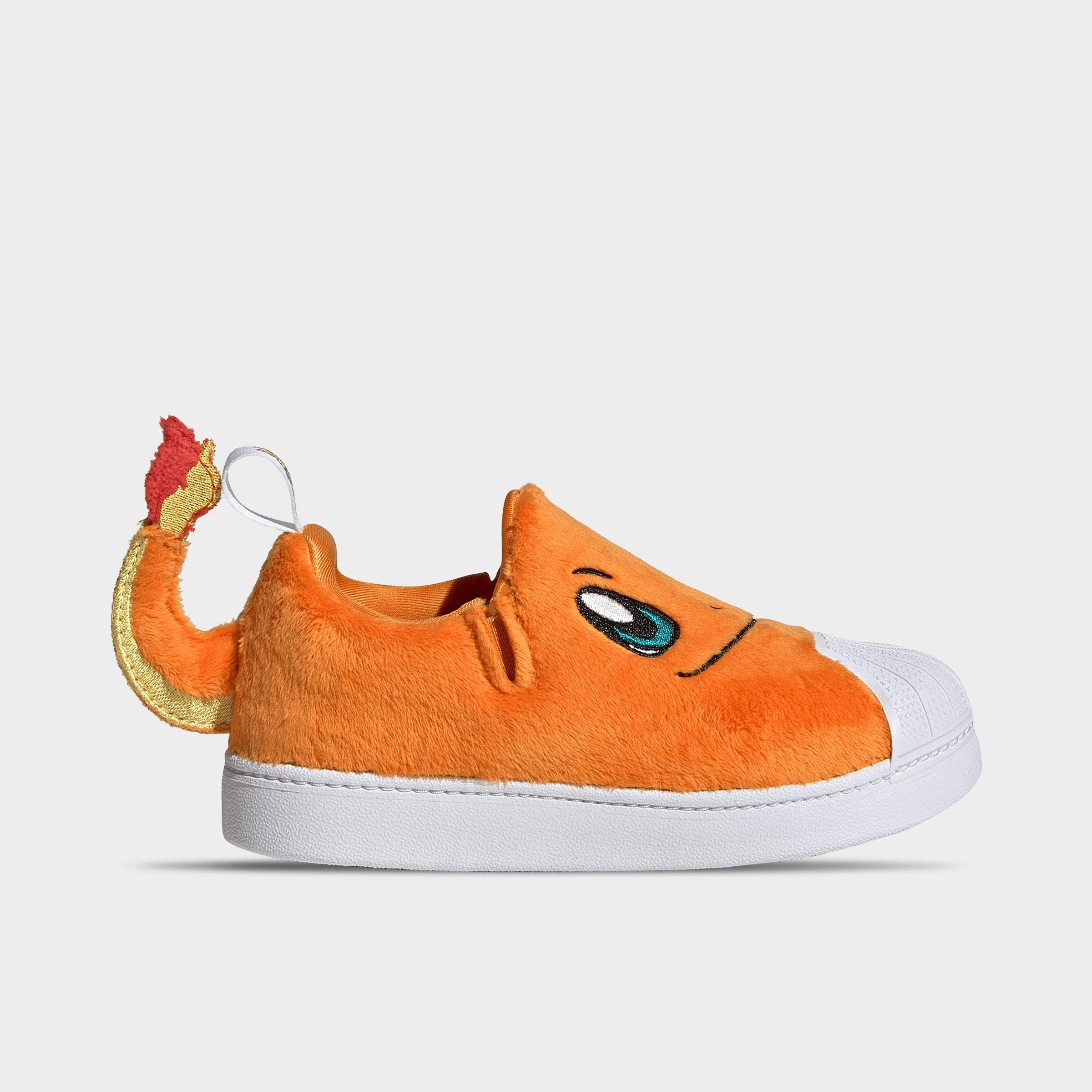 Little Kids' adidas x Pokemon Superstar Quickon Casual Shoes - Orange/Cloud White/Equipment Green - Left shoe facing left. Outside of the shoe.