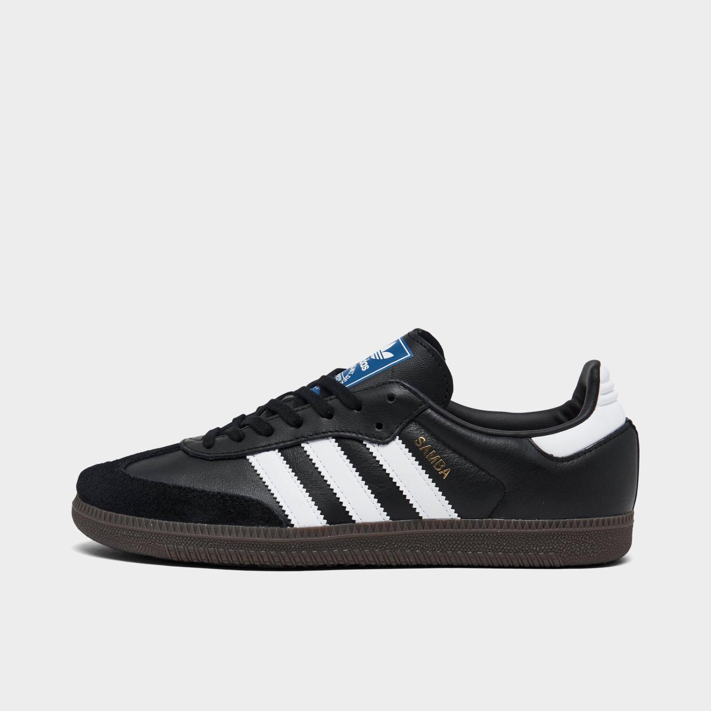 Big Kids' adidas Originals Samba OG Casual Shoes - Part 2 - Core Black/Footwear White/Gum - Left shoe facing left. Outside of the shoe.